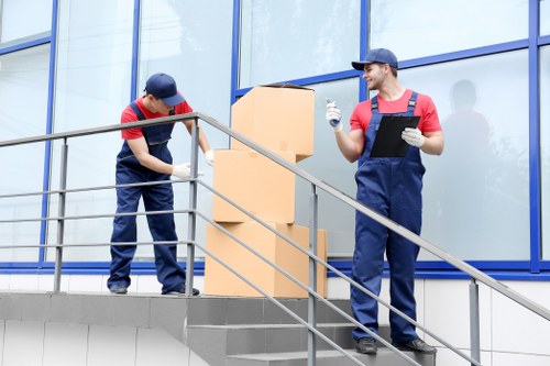 Man with van loading household items in Wallington