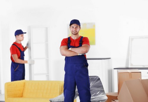 Professional house movers loading furniture for a Wallington home move