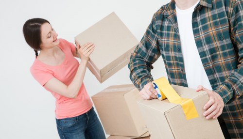Removal team handling boxes and packing support in Wallington