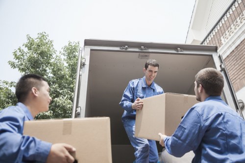 Local removal van transporting furniture and boxes near Wallington homes