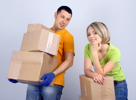 Local office removals team handling furniture in Wallington