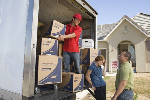 Careful wrapping and labelling of fragile belongings during a Wallington packing service